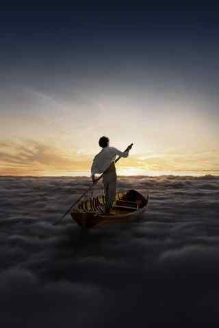 在云彩上划船的少年