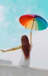 非主流美女雨伞阳光高清手机壁纸