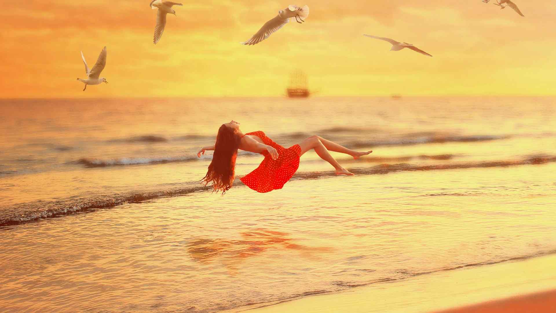 日落海边女孩红色礼服唯美壁纸